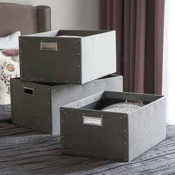 Caisse de rangement en carton avec poignées